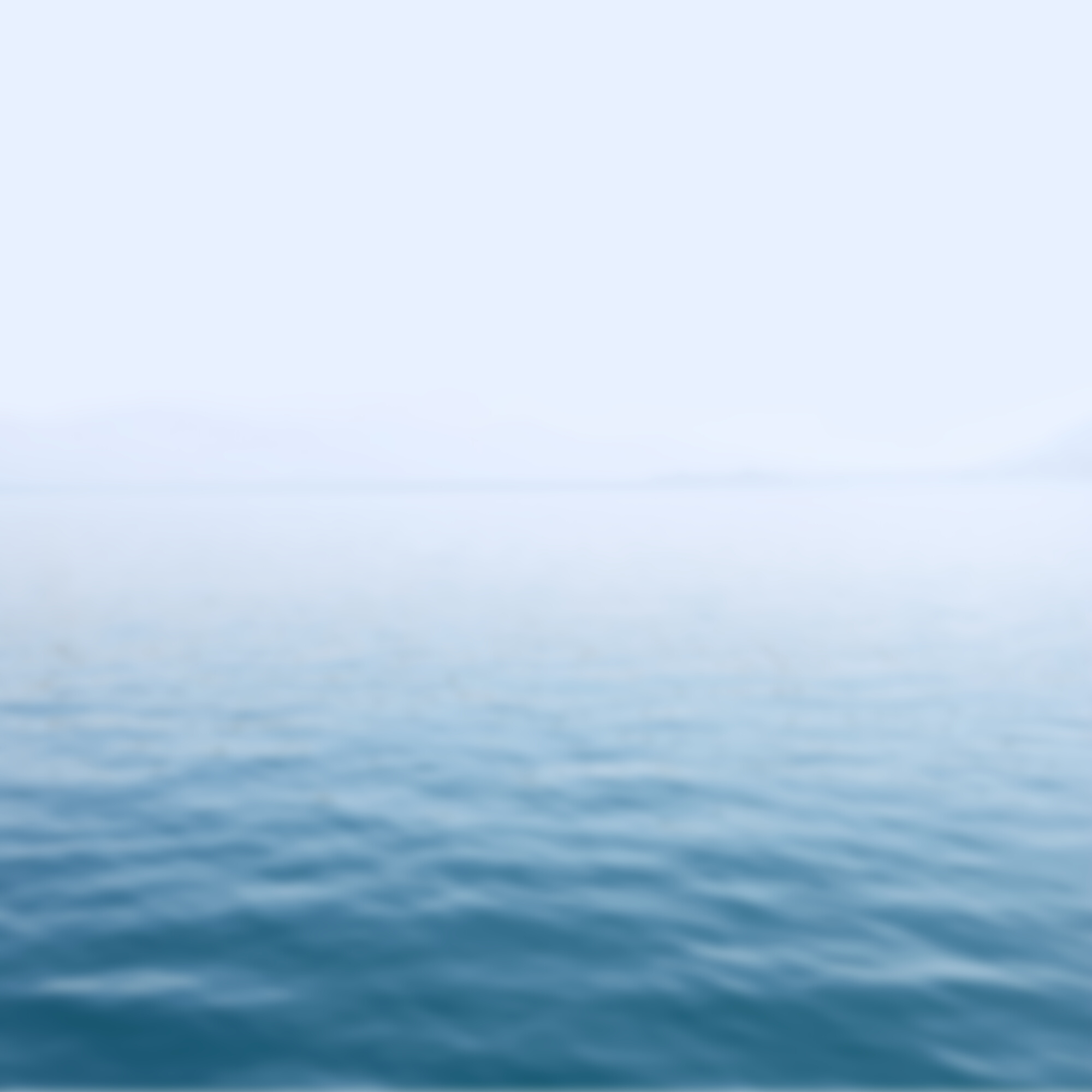 Scenic View of Calm Sea with Fog